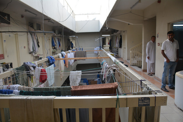 A labour camp in Dubai. Workers are allocated sleeping quarters based on nationality, and the number of occupants may be as high as eight per room. Credit: S. Irfan Ahmed/IPS